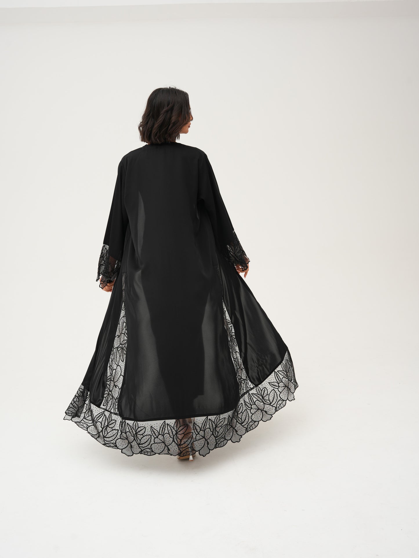 Intricate lace details abaya