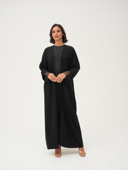 Front-lined beadworks and a unique net cuff on the sleeves abaya