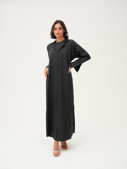 Collared abaya with textured fabric and delicate net detailing on the cuffs