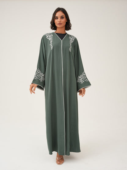 Green abaya with embroidery and piping details