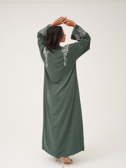 Green abaya with embroidery and piping details