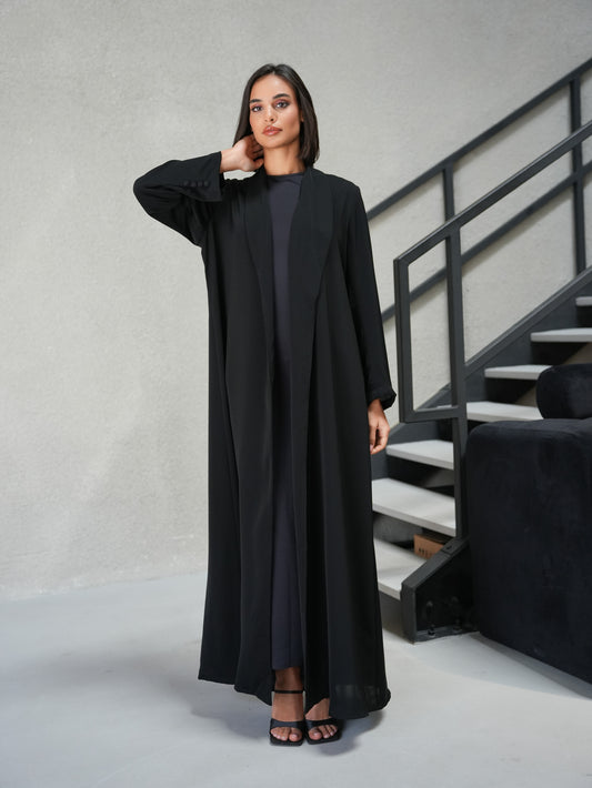 Collared abaya, featuring covered buttoned details