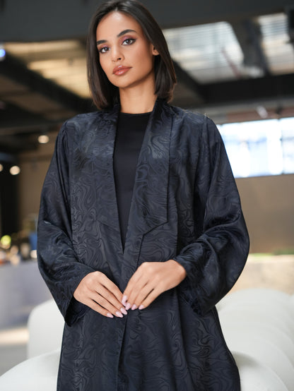 Collared abaya Crafted from luxurious printed silk